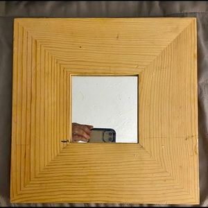 Mirror with wide wooden frame